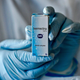 A health worker shows a box of Ivermectin, meant to be used in a trial that took place last year of patients with mild covid-19 in Cali, Colombia. The trial ultimately found no benefit.